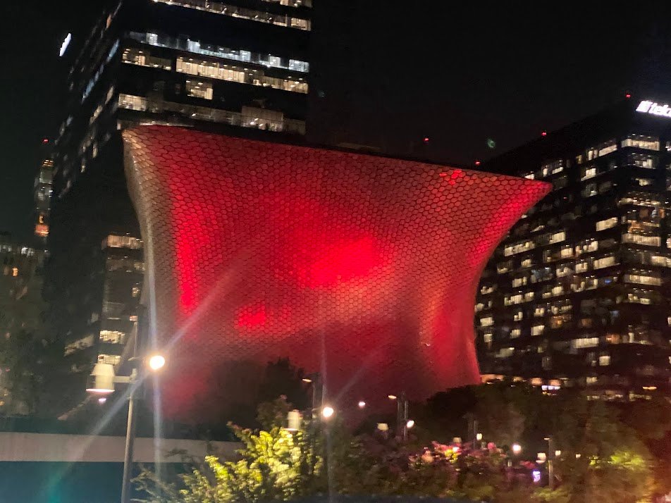 The spectacular Museo Soumaya, lit up at night.