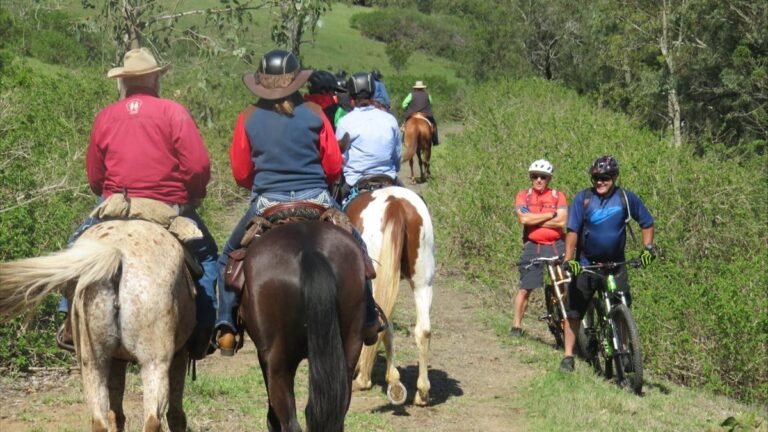 Horse riders and cyclists share the trail on the Brisbane Valley Rail Trail.
