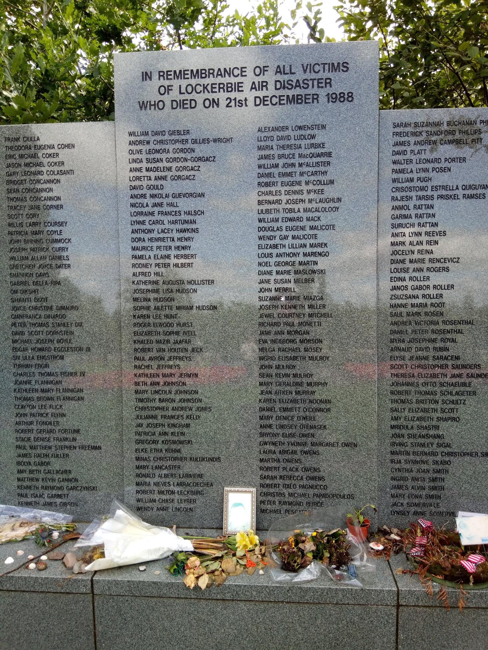 Lockerbie memorial garden, Scotland. This tall wall lists the names of 259 who died on board Pan Am Flight 103 – passengers and crew.