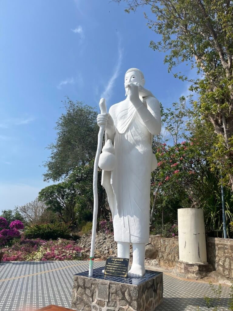 Phra Sivali, a highly revered arahant (a disciple of the Buddha) known as the patron saint of fortune, abundance, and safe travel. Wat Khao Tapiap, Thailand.