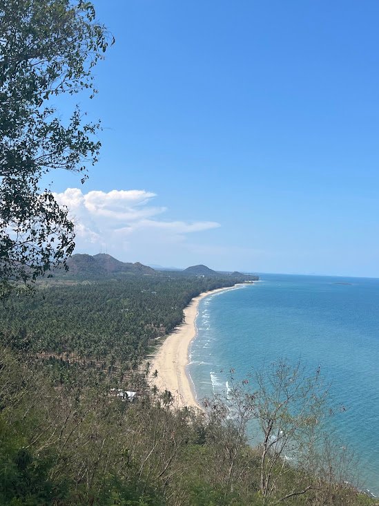 View north along the coast from Phra Marahat Chedi, Ban Krut, Thailand.
