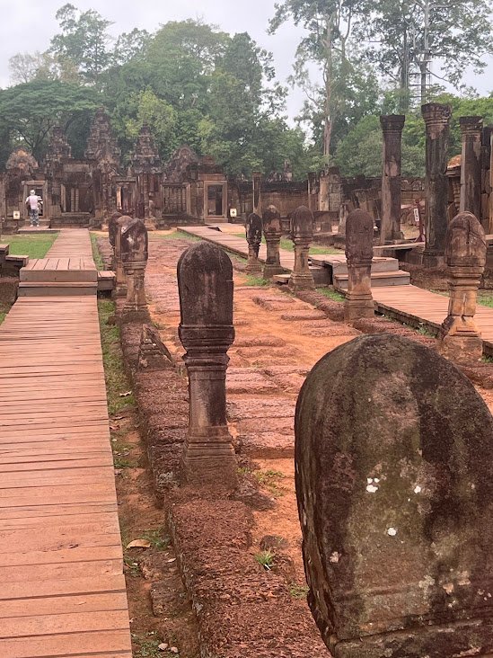 Banteay Srei temple, Cambodia. This is the pathway to the temple, lined with lingas. All made out of the local red sandstone.