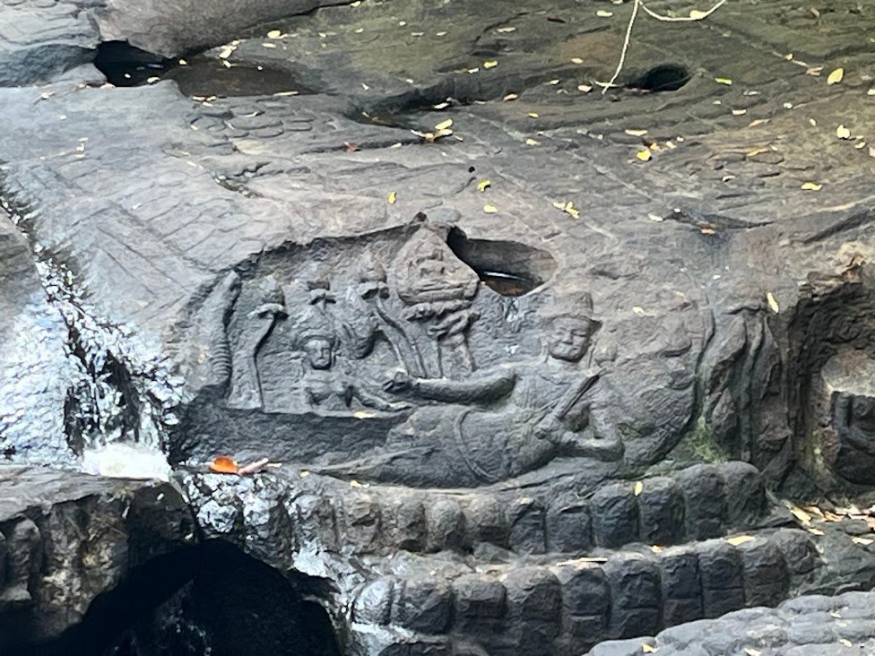 Some 12th century rock carvings at Kbal Spean waterfall, Cambodia in the dry season.