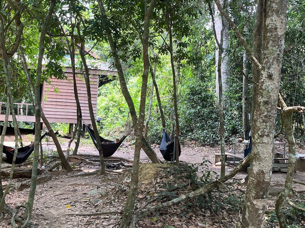 Near Kbal Spean waterfall, Cambodia. Folks in hammocks.